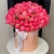 Композиция в шляпной коробке из 113 пионов Корал Шарм в Щелково